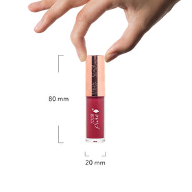 100% PURE Lip Gloss Pomegranate Wine sample on hand showing berry tint and shine.