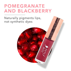 100% PURE Lip Gloss Pomegranate Wine close-up captures mirror-like shine.