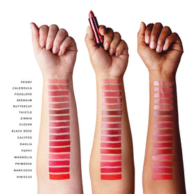 Vitamin E and tomato nourish lips with 100% PURE Poppy lipstick.