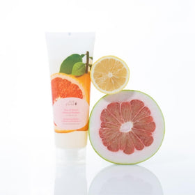 Hair massaged with 100% PURE Yuzu & Pomelo Glossing Shampoo for gentle cleansing.