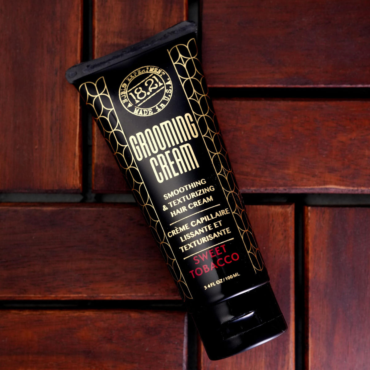 18.21 Man Made Grooming Cream premium packaging signals quality.
