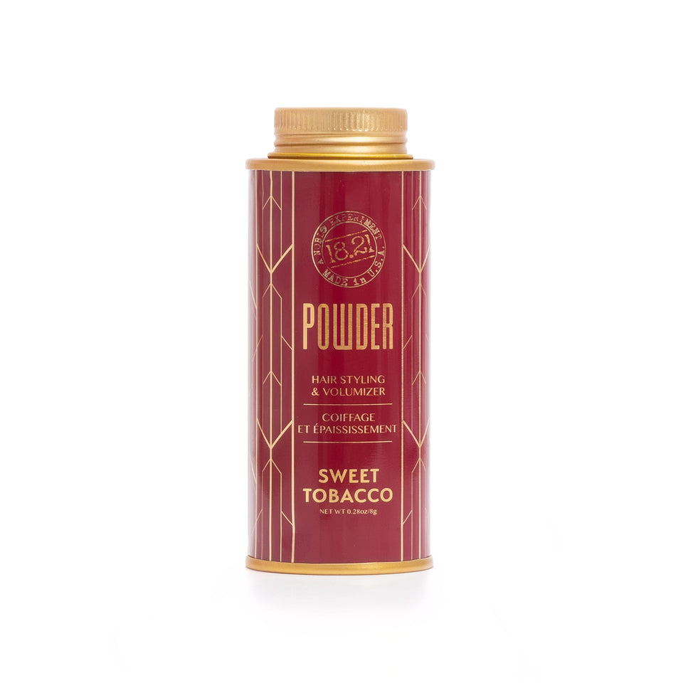 18.21 Man Made Hair Powder bottle closeup highlighting premium packaging and matte finish.