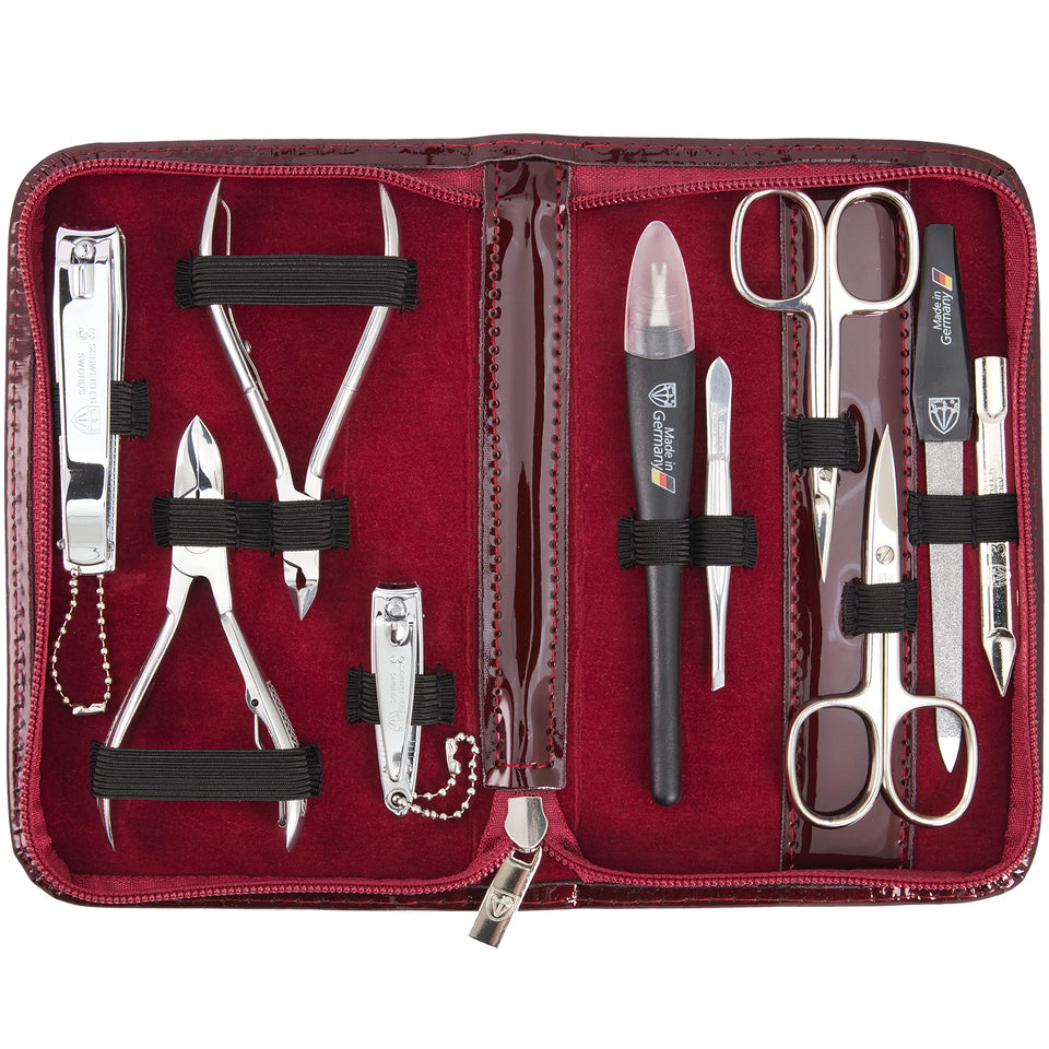 3 Swords Germany manicure kit in burgundy leather case for elegant storage.