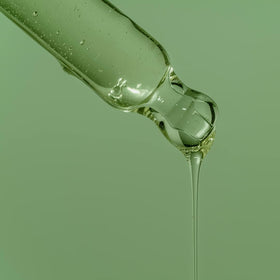 A&amp;A Premium Body Mineral Oil pour demonstrates a non-greasy glide for massage routines.