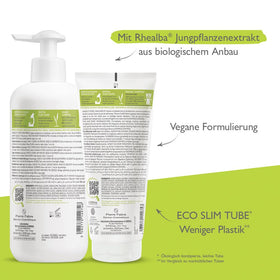 Hands applying A-Derma Exomega Control Milk for soft, moisturized skin.