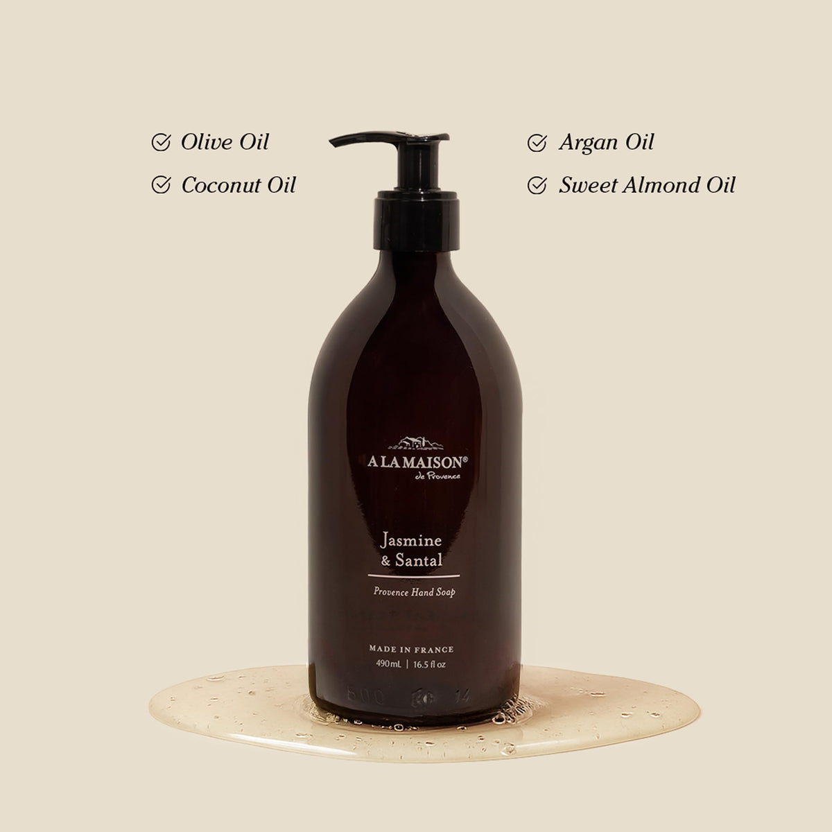 A LA MAISON amber-glass bottle highlights reusable packaging and timeless French style.