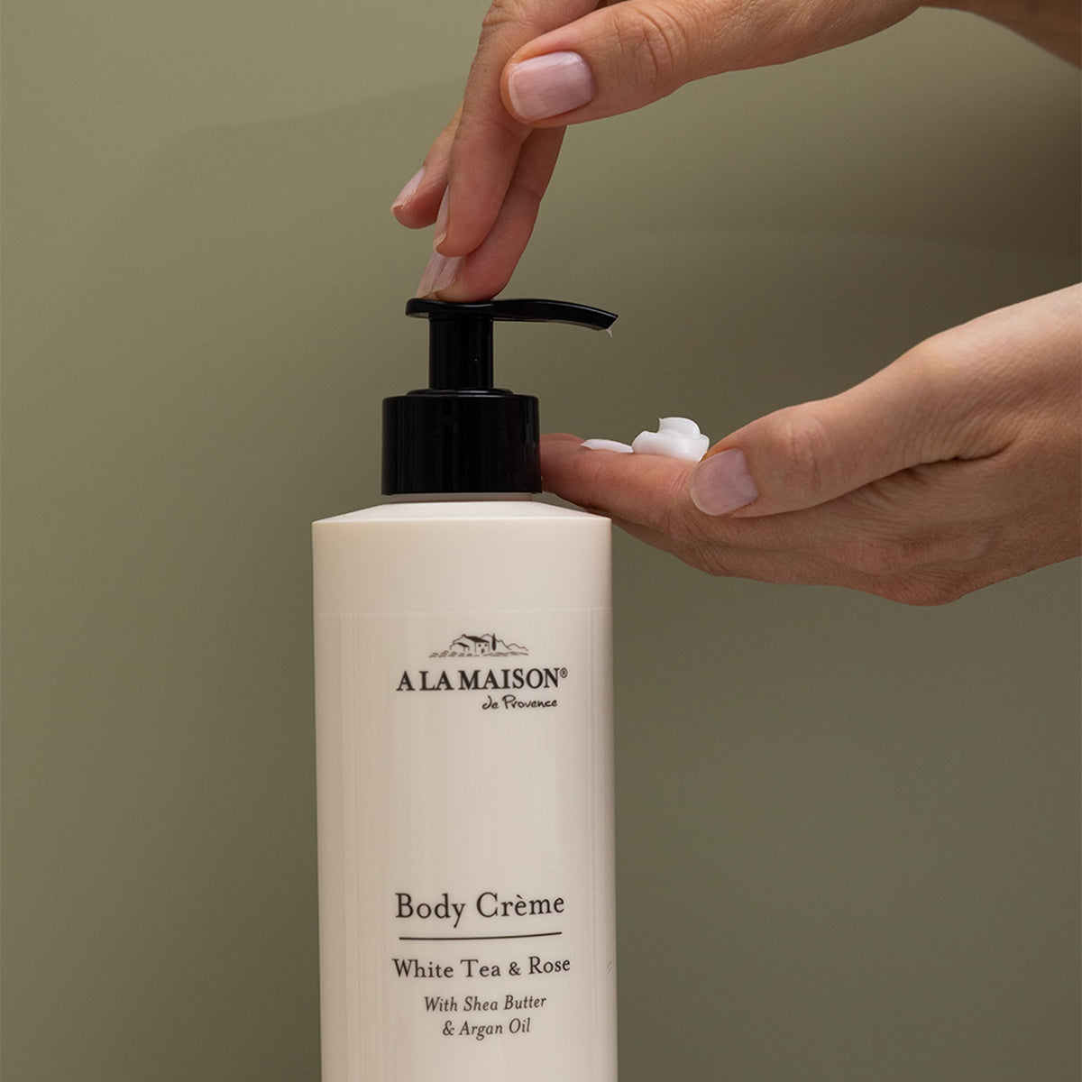 A LA MAISON body crème with Argan & Avocado oils nourishes soft, smooth skin