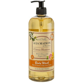 A LA MAISON Citrus Blossom body wash bottle close-up showing hydrating lather for daily cleansing.