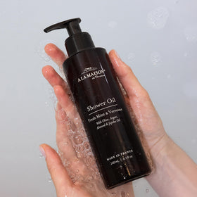 A LA MAISON Cleansing Shower Oil foamy lather demonstrates gentle cleansing texture.