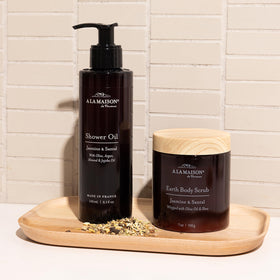 A LA MAISON Cleansing Shower Oil close-up of olive and argan oils for hydration.