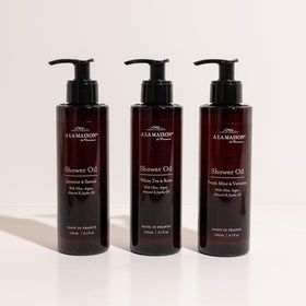 A LA MAISON Cleansing Shower Oil sustainable bottle emphasizing recycled plastic.