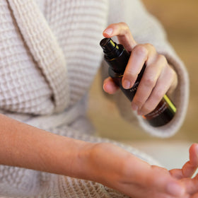 A LA MAISON Bathroom setting suggests versatile use on body and hair.