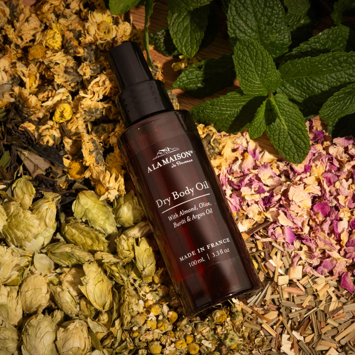 A LA MAISON spray dispenses a fine mist for even, quick absorption.