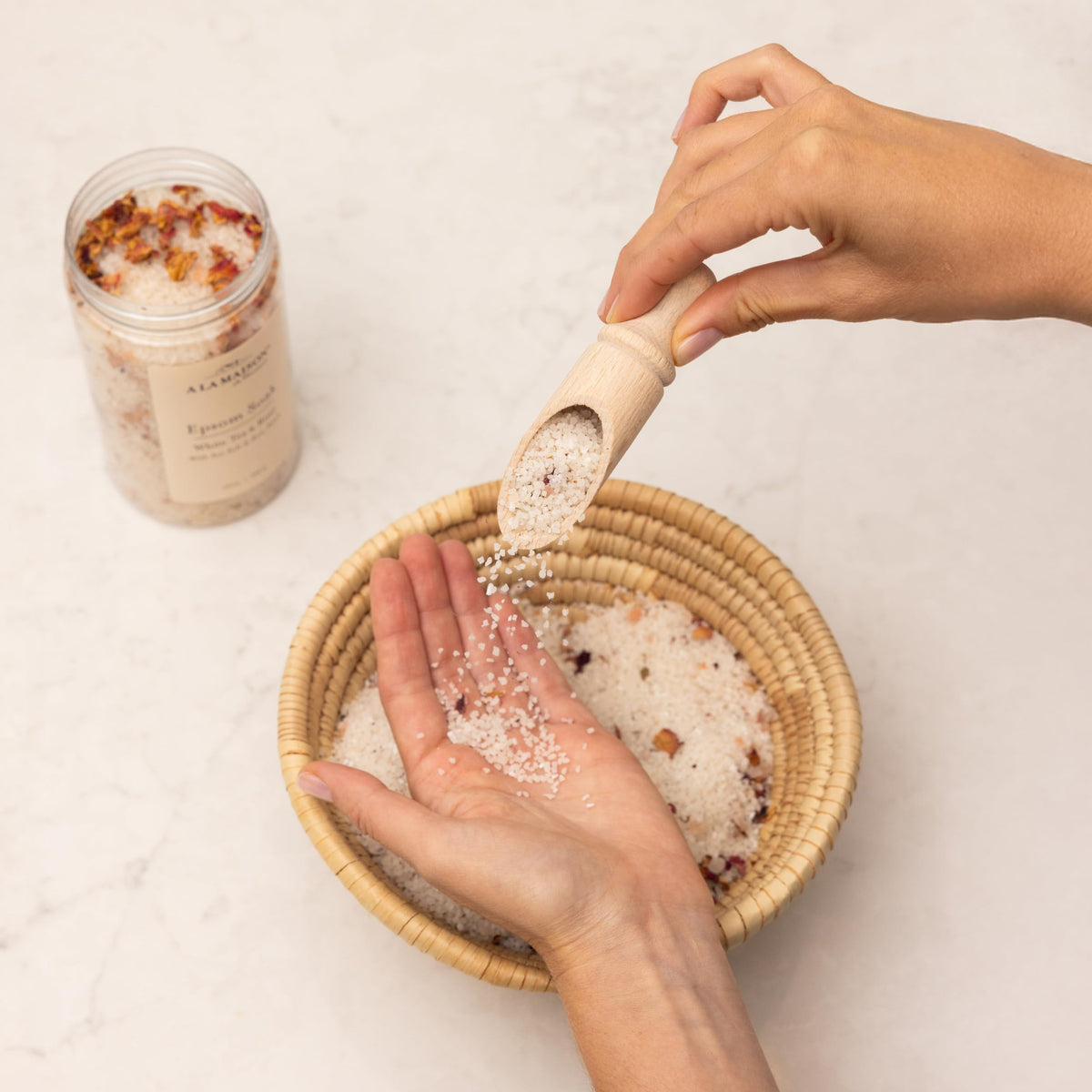 A LA MAISON Epsom Salt Bath Soak shows Sea Minerals enriching the bath