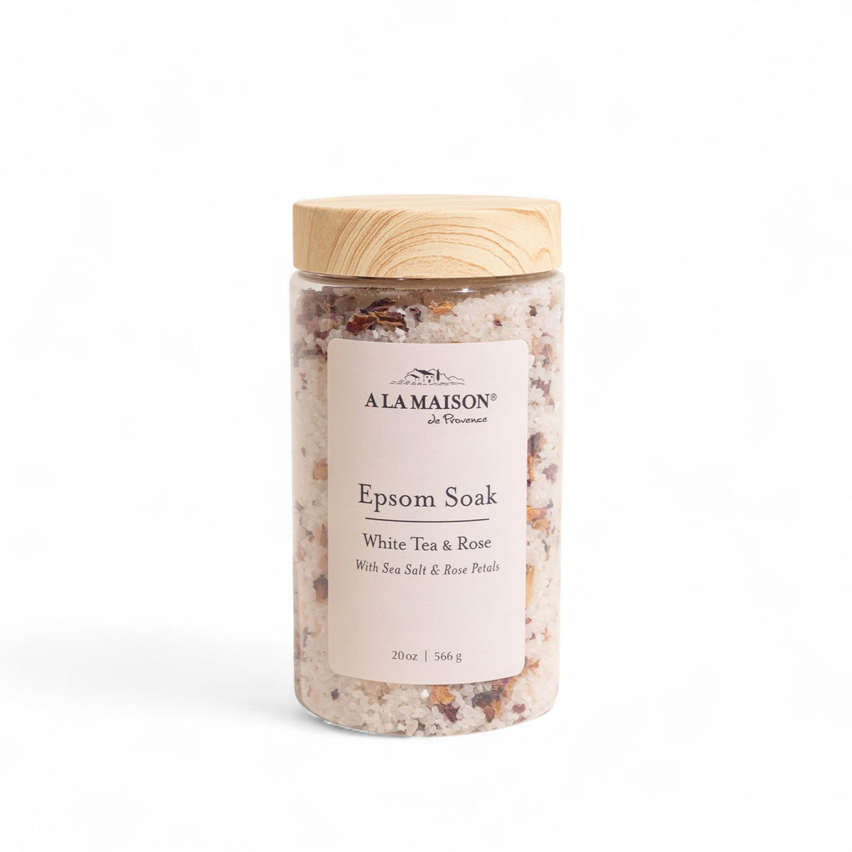A LA MAISON Epsom Salt Bath Soak bottle with White Tea & Rose promotes calm during spa ritual
