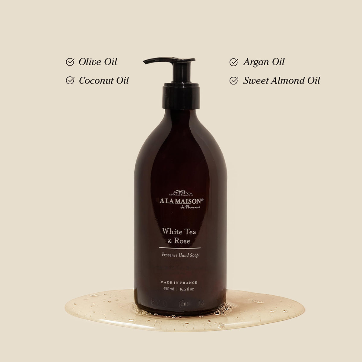 A LA MAISON glass hand wash dispenser with pump, plant-based formula for soft hands