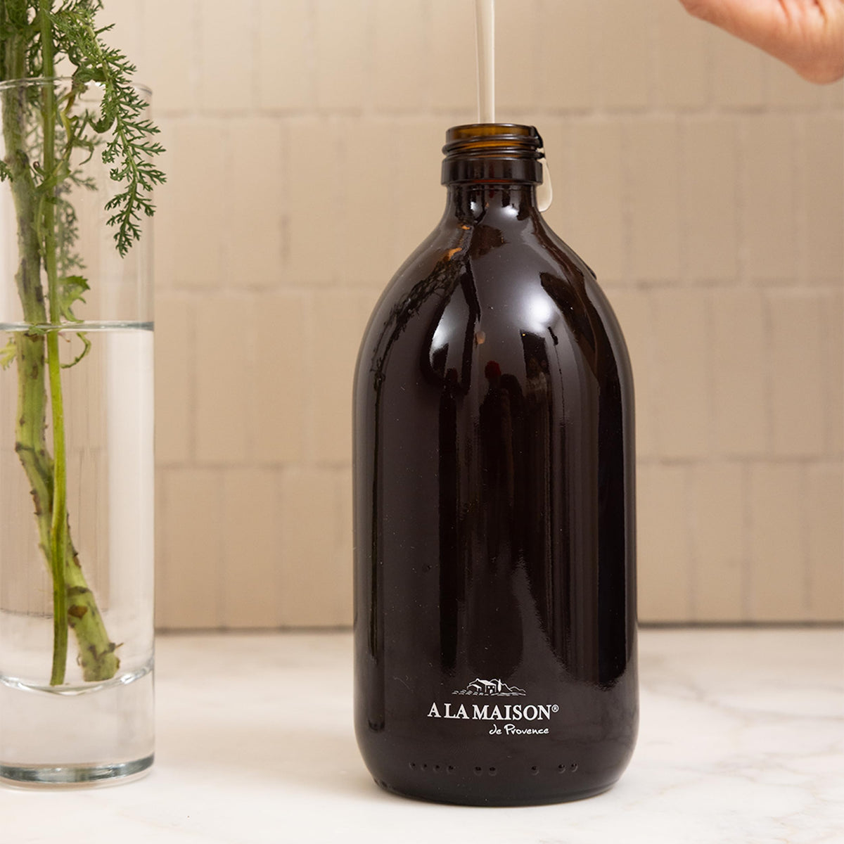 A LA MAISON hand soap gift set in reusable glass bottle, biodegradable formula