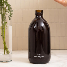 A LA MAISON hand soap gift set in reusable glass bottle, biodegradable formula