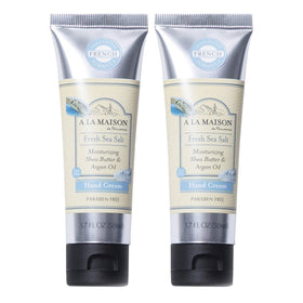 A LA MAISON Moisturizing Cream bottle with sea salt scent, quick absorption, and silky finish.