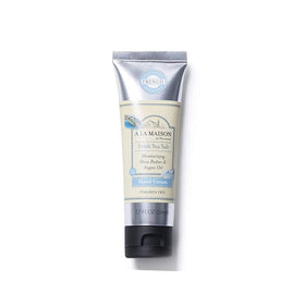 A LA MAISON cream iconography featuring shea butter and argan oil for nourishment.