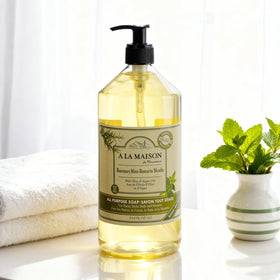 Provence-style bathroom scene with A La Maison soap bottle.