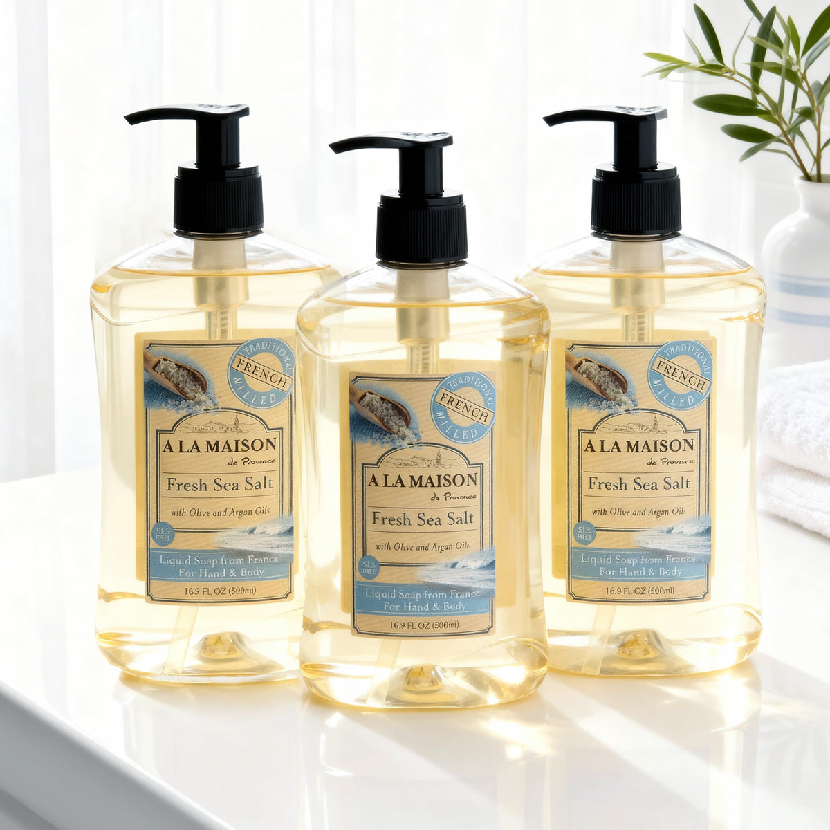 A LA MAISON three-pack packaging showcases eco-friendly, recyclable bottle.