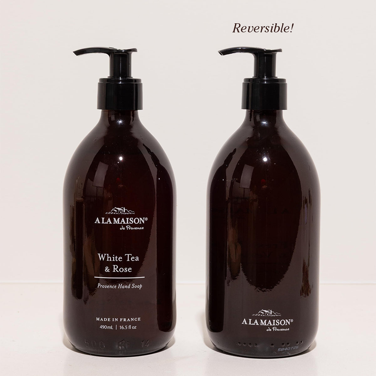 A LA MAISON White Tea & Rose label detail, premium fragrance enhances bathroom ambience