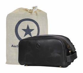 Aaron Leather Goods Vendimia Estilo 10-inch toiletry pouch with waterproof lining for travel organization.