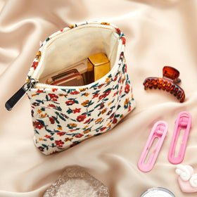 Abbylike canvas-interior pouch protects cosmetics with sturdy lining.