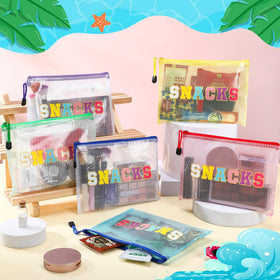 Abbylike letter bag with colorful patches, stylish travel accessory for personal items.
