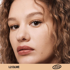 about-face THE PERFORMER olive doe-foot wand for precise, quick application.