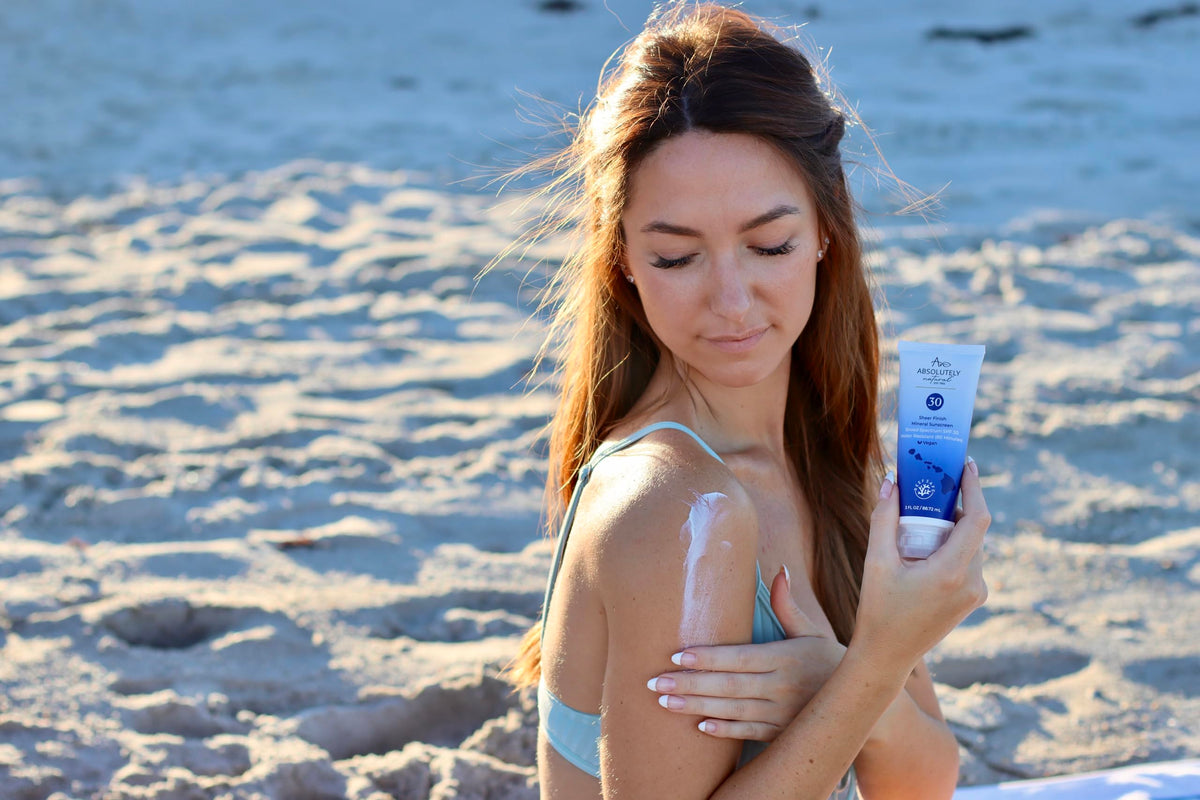 Absolutely Natural SPF 30 mineral sunscreen with Vitamin E antioxidants shown.