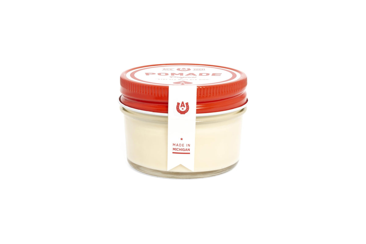 Ace High Pomade natural shine jar enhances a polished finish.