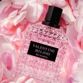 A Center elegant glass bottles with premium finishes catching light