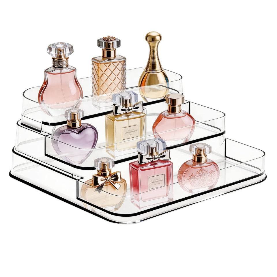 A Center three-tier bathroom organizer front view shows stable acrylic storage for cosmetics and perfumes.