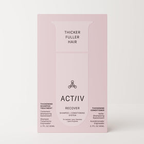 ACTIIV Recover Travel Duo conditioner bottle showcased, hinting at smoother, healthier-looking hair on journey.