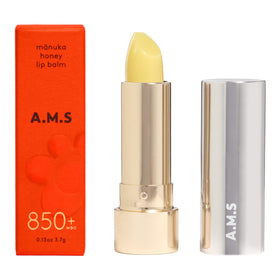 ACTIVIST A.M.S lip balm bottle with beeswax and Manuka honey for hydration.
