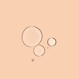 Acure AI Peptide Serum applying to skin shows quick absorption.