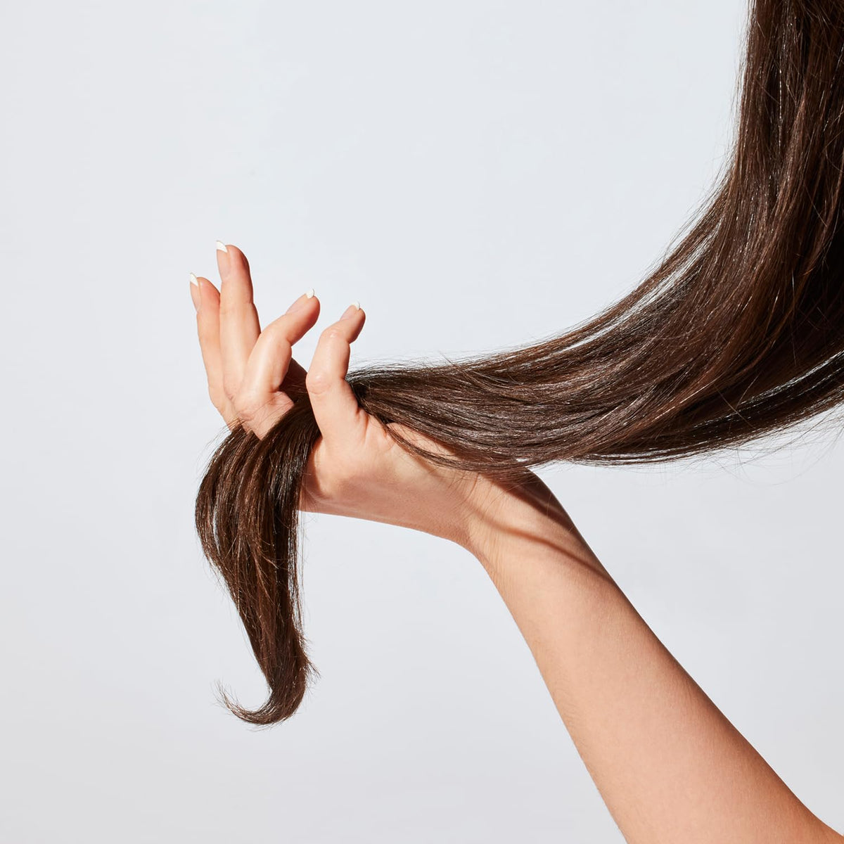 Acure Conditioner applied mid-length to ends after shampoo