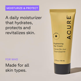 Acure Brightening Day Cream with argan oil droplets suggesting nourishing moisture