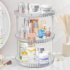 Adoco 3 Tier Diamond Lazy Susan on vanity countertop with clear rotating shelves for easy access to cosmetics