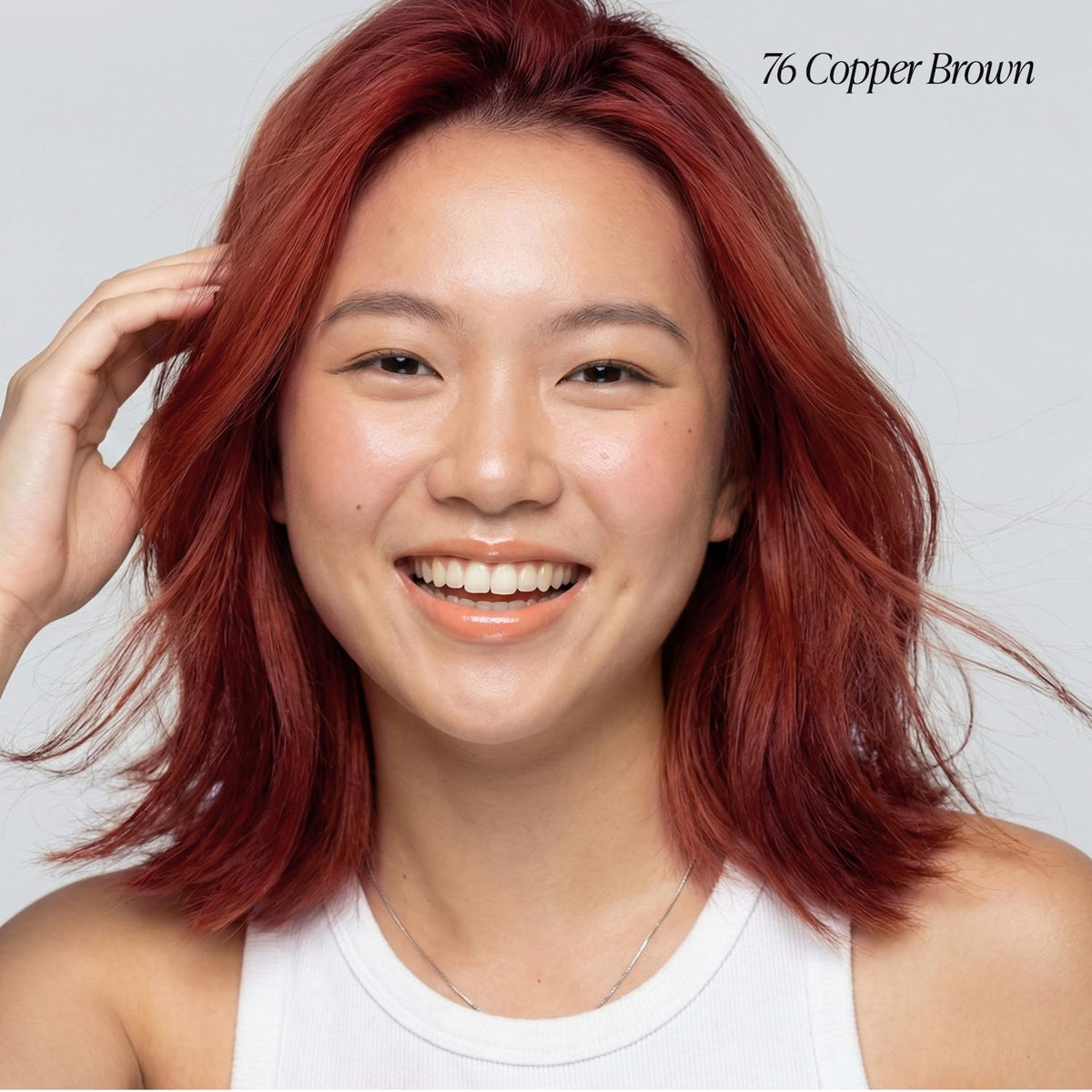 Adore Copper Brown color swatch demonstrates rich copper tone and even coverage.