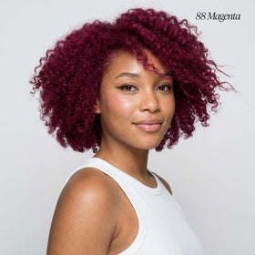 Adore Magenta applying color on hair demonstrates easy at-home use