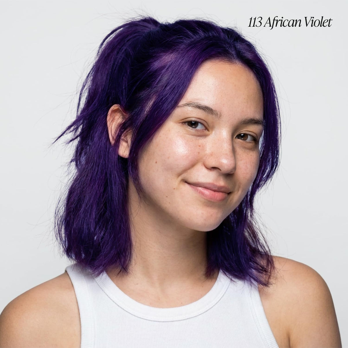 Adore African Violet color being applied evenly across hair.