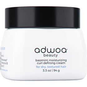 Adwoa Beauty Baomint Cream bottle close-up showing rich moisture for defined curls