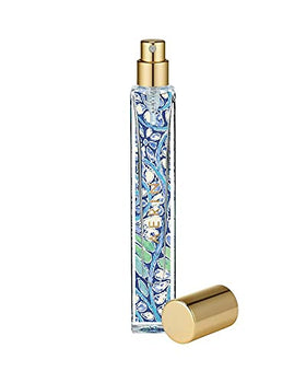 AERIN Mediterranean Honeysuckle cap closeup highlighting premium bottle design