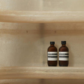Aesop Amazing Face Cleanser water rinse — leaves balanced, clean skin.