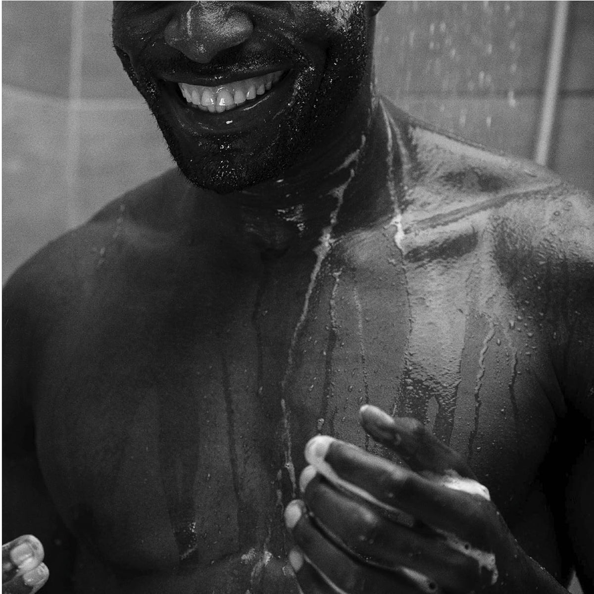 Applying Aesop conditioner refill to damp hair for softness