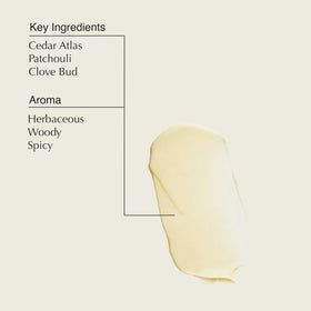 Application moment of Aesop Geranium Leaf Body Balm for smooth skin.