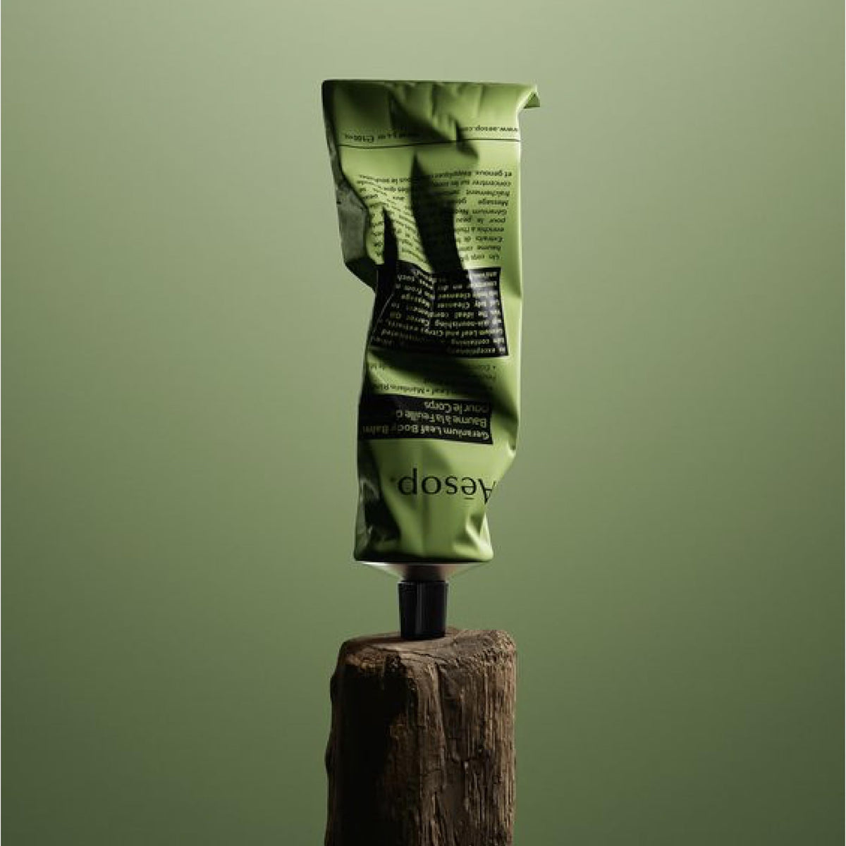 Dried elbows and knees being treated with Aesop Geranium Leaf Body Balm.